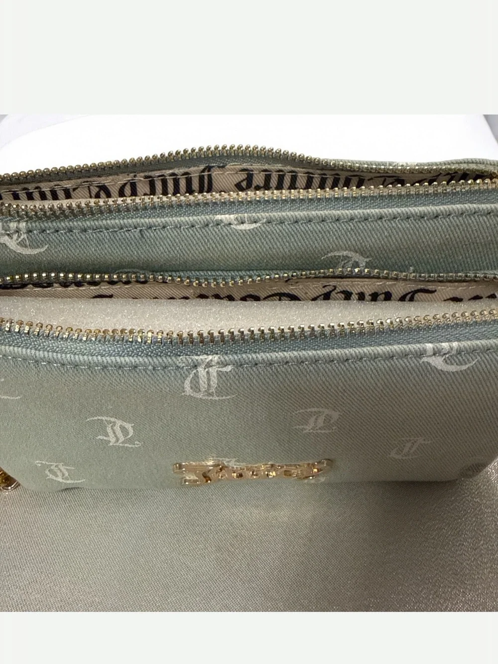 Juicy Couture light denim Monogram Canvas Wristlet with strawberry charm